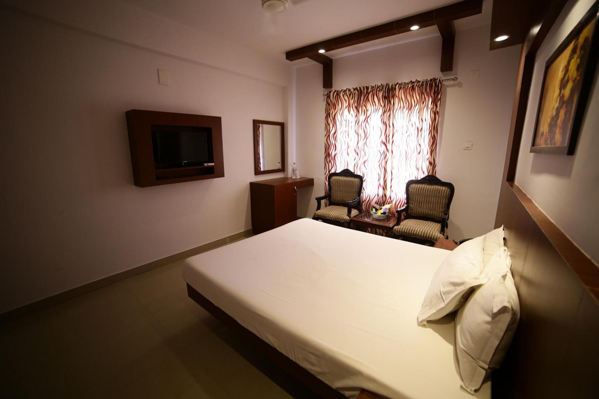 The Vyshakh Hotel Guruvāyūr Buitenkant foto